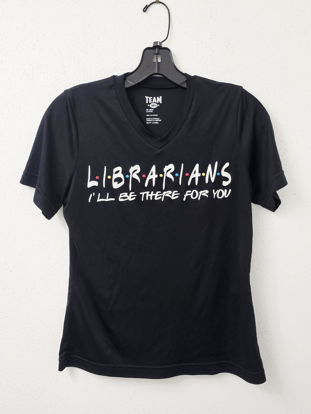 Team 365 dri-fit t-shirt features Friends with "Librarians" written iconic Font